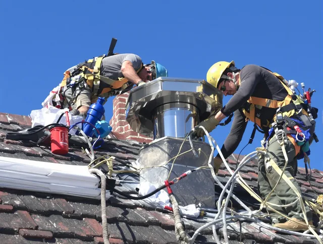 Protective chimney cap installed by Glocester Chimney Sweep in Glocester, RI