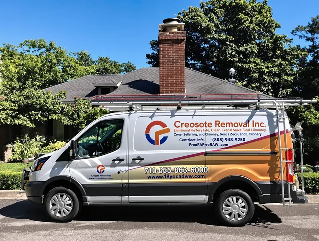 Glocester Chimney Sweep technician removing creosote safely in Glocester, RI